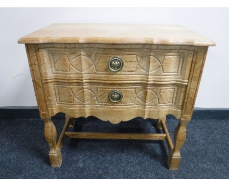 A light oak two drawer chest 