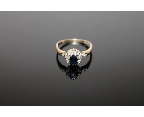 A 9ct gold sapphire cluster ring