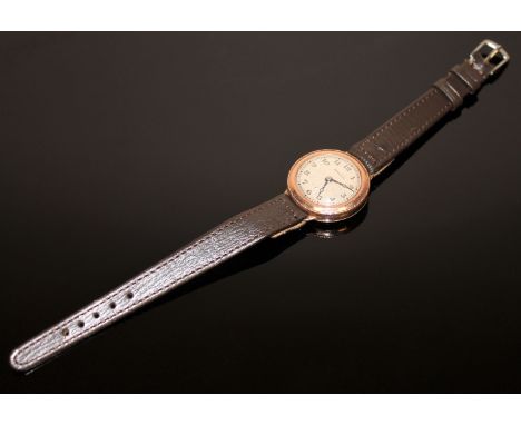 An early twentieth century 9ct gold Harwood wrist watch
