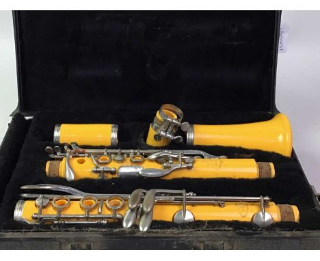 AMBER COLOURED CLARINET, WOODWIND COMPANY, USA Reso Tone 3, in case, along with another incomplete clarinetQty: 2