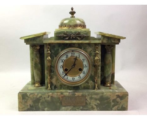 VICTORIAN ONYX MANTEL CLOCK, the round white dial with Roman numerals, the architectural case with corinthian columns, on a b