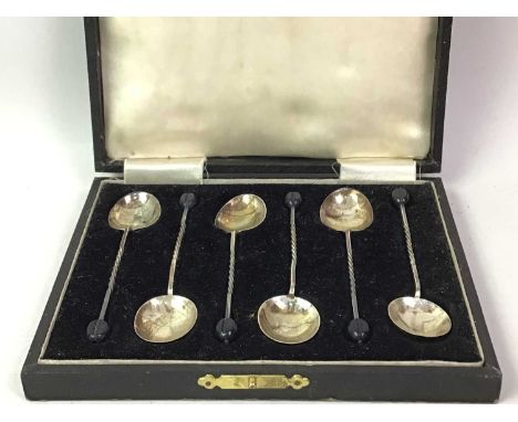 SET OF SIX GEORGE V SILVER COFFEE SPOONS, AND OTHER ITEMS with part barley twist stems, along with other items, comprising a 