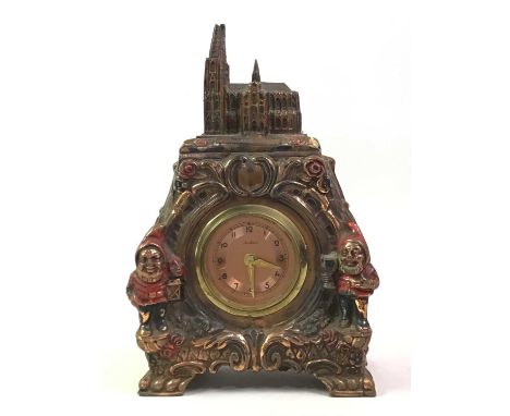 TWO EDWARDIAN MAHOGANY MANTEL CLOCKS, ALONG WITH A CONTINENTAL CAST METAL MANTEL CLOCK  modelled with cathedral Kolner Domthe