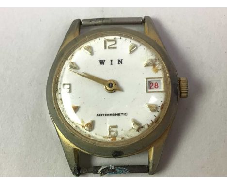 COLLECTION OF WATCHMAKER'S PARTS, including movements, glass, mainsprings, tools, stems, and more, partially contained in a m
