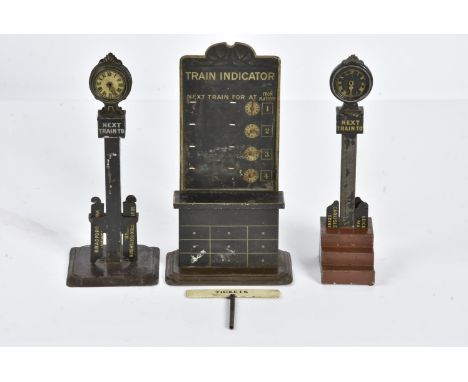 Bing 0 Gauge Platform Accessories, two 'clock tower' type Next Train indicators, one on large square base with white clock fa