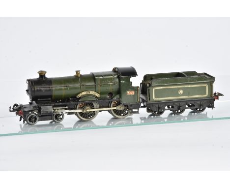 A modified/re-chassised Hornby 0 Gauge No E220 Special GWR 4-4-0 Locomotive and Tender, an original clockwork loco re-motored