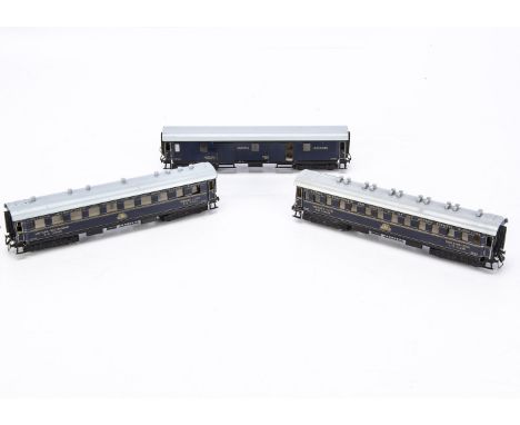 Three uncommon pre-war Trix Express HO Gauge Wagons-Lits Coaches, all in CIWL royal blue livery with gold lettering and light