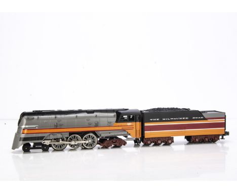 An American 0 Gauge Milwaukee Road 'Hiawatha' streamlined 'Hudson' 4-6-4 Steam Locomotive and Tender by Rail King, ref 30-112