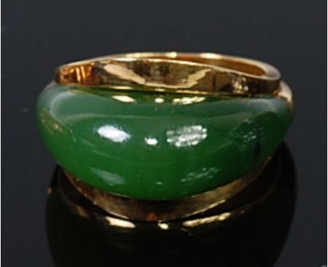 A modern 18ct gold and green jade set dress ring, 12g, size N