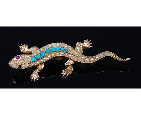 A 15ct gold, seed pearl and turquoise set lizard brooch having ruby set eyes, note one ruby and two seed pearls missing, 3.5g