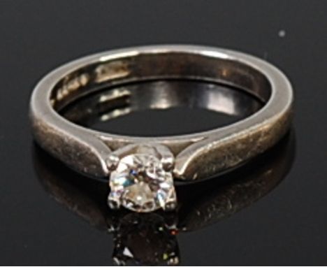 A platinum diamond solitaire ring, the four claw set brilliant weighing approx 0.36ct, 4.5g, size K/L