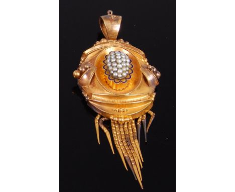 A Victorian yellow metal and seed pearl set mourning pendant, apparently unmarked but tests as approx 18ct, centre set with a