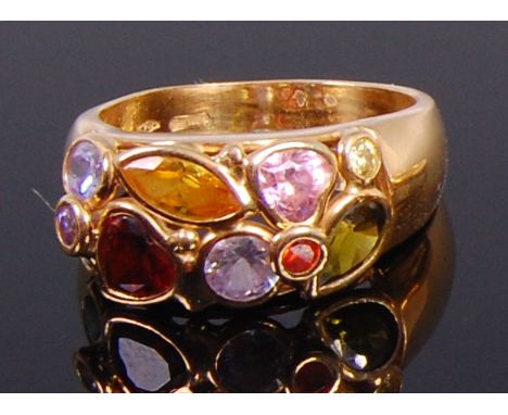 A modern 18ct gold multi semi-precious gem set ring, to include garnet, amethyst, topaz etc, 9g, size Q