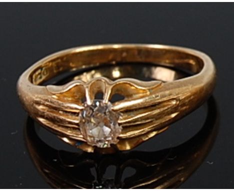 An 18ct gold gents diamond solitaire ring, the gypsy set cushion cut diamond weighing approx 0.45ct, 5.8g, size T