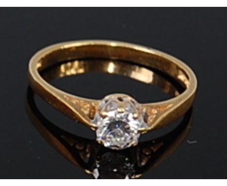 An 18ct gold diamond solitaire ring, the claw set brilliant weighing approx 0.25ct, 1.9g, size K