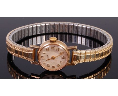 A ladies Tudor Royal yellow metal cased wrist watch having a signed silver dial with Arabic numerals, manual wind movement, a