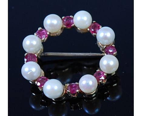 A 9ct gold, ruby and cultured pearl set brooch, 3.5g, dia. 2.4cm