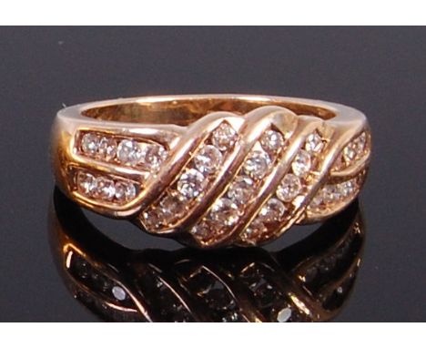 A modern 9ct gold multi-diamond set dress ring, the centre set with three rows of five small graduated brilliants, 5.3g, size