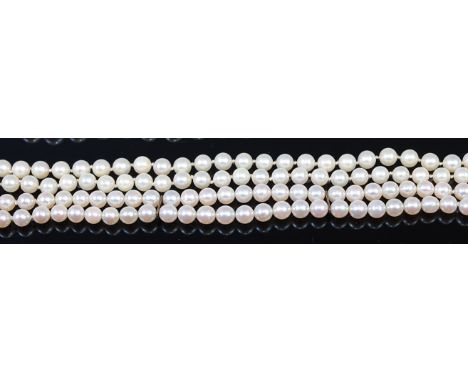 A cultured and knotted pearl single string necklace, having pierced elliptical 9ct gold clasp, length 49cm; together with a c