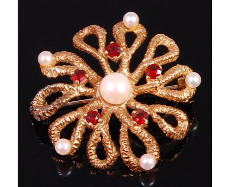 A 1970s 9ct gold, garnet and cultured and seed pearl set flower head brooch, gross weight 10.8g, maker HB, 3.5cm