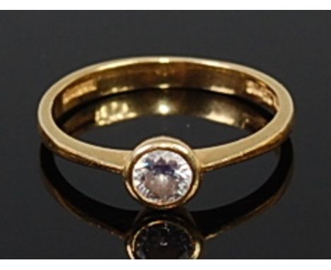 An 18ct gold diamond solitaire ring, the illusion set brilliant weighing approx 0.25ct, 2.4g, size L