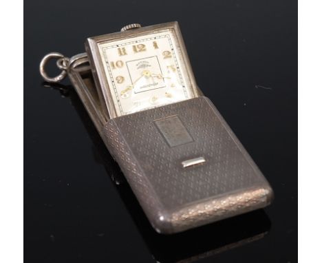 A Rotary silver cased purse watch, the engine turned case with sliding cover opening to reveal signed hinged dial, having Ara