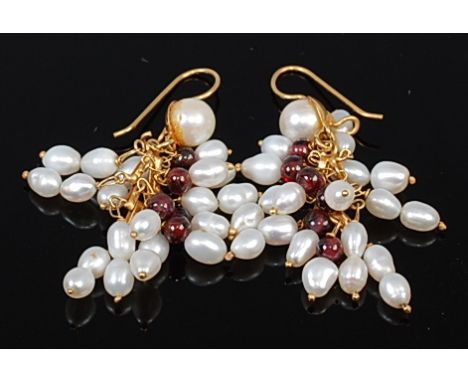 A pair of cultured pearl and garnet set ear pendants, each as multi-strands and on 18ct gold shepherd's crook fittings, gross