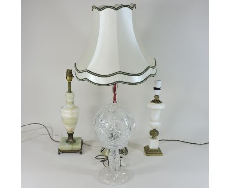 A cut glass table lamp, together with three other lamps