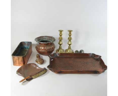 A collection of metalwares, to include a copper powder flask, tray and planter