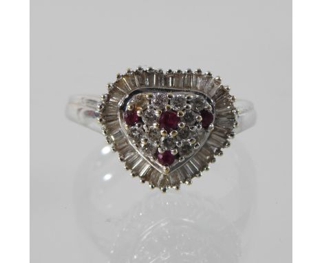 A 9 carat gold ruby and gem set ring, boxed
