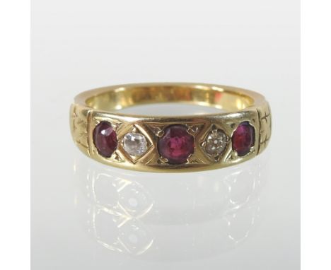 An unmarked ruby and diamond half hoop eternity ring, set with five alternating stones