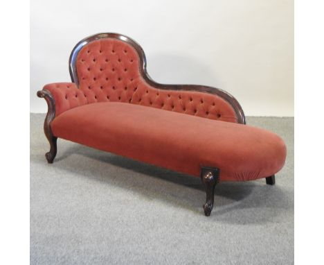 A Victorian mahogany and red upholstered button back chaise longue, 170cm