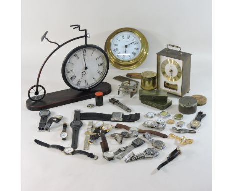 A box of wristwatches and watchmakers tools