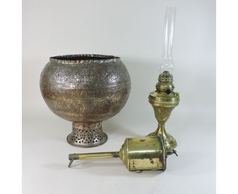 A brass mechanical spit roast, together with and an oil lamp and a copper vase, 35cm high 