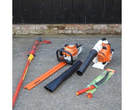 A Stihl petrol hedgecutter, together with a leaf blower and a lopper