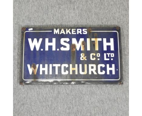 A vintage enamel sign, Makers W H Smith and Company Ltd, Whitchurch, 36 x 61cm
