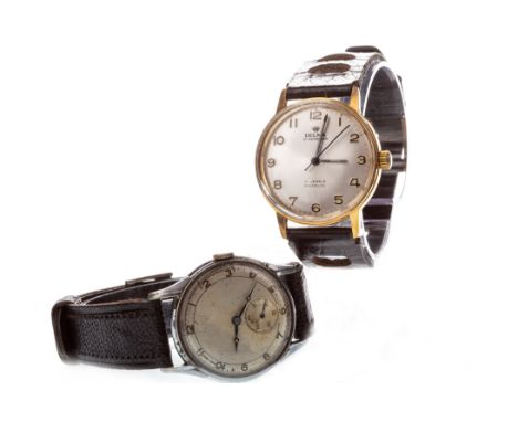 GENTLEMAN'S DELMA GOLD PLATED MANUAL WIND WRIST WATCH, the round silver coloured dial with applied gold coloured Arabic numer