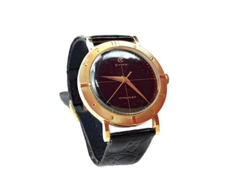 GENTLEMAN'S CYMA CYMAFLEX EIGHTEEN CARAT GOLD MANUAL WIND WRIST WATCH, signed Cyma 17 jewel movement, the round black dial la