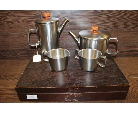STYLISH MID-CENTURY VINER'S OF SHEFFIELD STAINLESS STEEL TEA SERVICE
comprising a teapot, water pot, sugar and cream; togethe