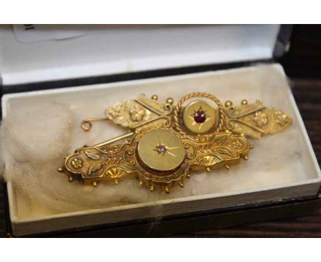 TWO VICTORIAN NINE CARAT GOLD BAR BROOCHES
one set with a rose cut diamond, the other set with a ruby, both hallmarked on the