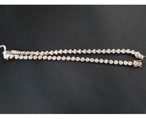 2 SILVER BRACELETS 