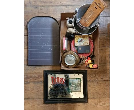 A Black &amp; White Scotch Whisky advertising figure, a slate Shove Ha'penny board, and assorted breweriana