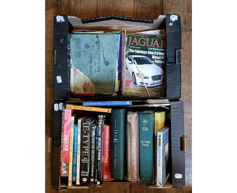 Assorted books, mostly Jaguar, including a 3.8 E Type Service Manual, a group of magazines, and a rear exhaust system for a m