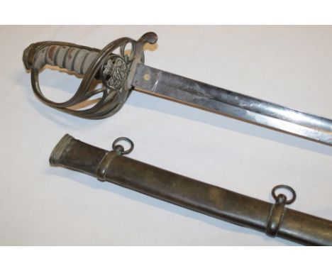 A Victorian Infantry Officer's sword with 32" etched steel blade by J Jones of Regents Street London, brass guard and wire-bo