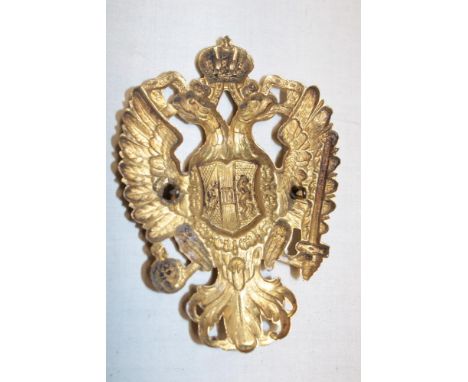 An Imperial Austrian brass double eagle helmet plate