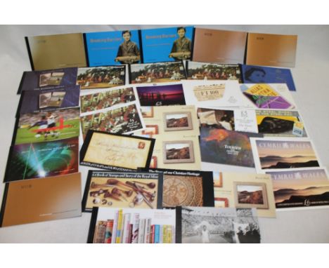 A collection of approximately fifty Royal Mail booklets of stamps including British Army uniforms, Charles Darwin, Royal Navy