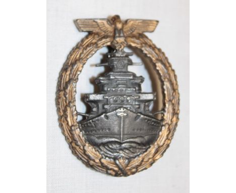 A Second War German Kriegsmarine High Seas Fleet badge marked to the reverse for R Simm & Sohne - Gablonz 