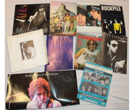 A selection of 1960s - 1980s music souvenir programs including The Who and The Spencer Davis Group; The Rolling Stones Black 