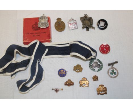 A silver Girl Guides medallion with neck ribbon, a selection of various Girl Guides medallions and badges; a silver mounted A