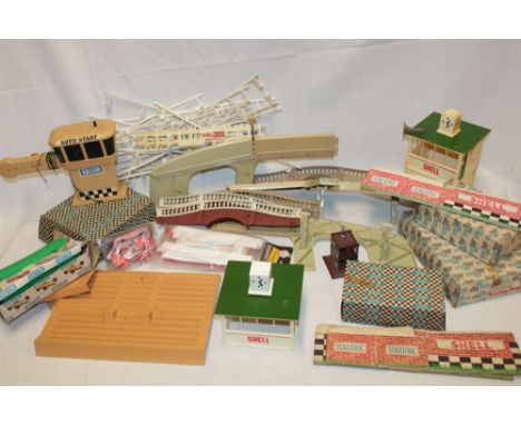 A selection of Scalextric including boxed track, control tower, flyover, bridges etc 